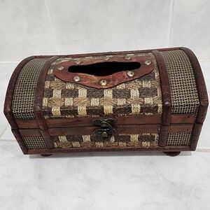 Tissue box made of lightweight wood.